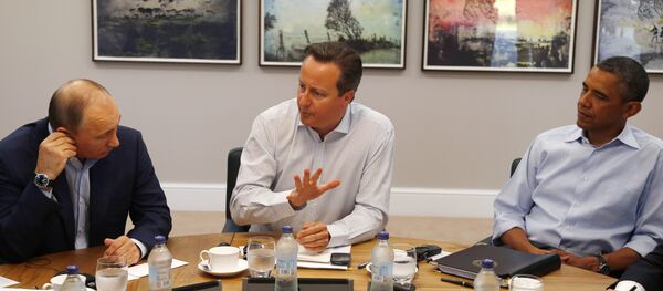 From left, Russian President Vladimir Putin, Britain's Prime Minister David Cameron and US President Barack Obama. From left, Russian President Vladimir Putin, Britain's Prime Minister David Cameron and US President Barack Obama. - Sputnik International