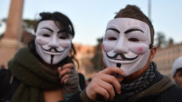Protesters wear Guy Fawkes masks (Anonymous) during a demonstration of the “Forconi” (the Pitchforks) against austerity policies and the Italian government on December 18, 2013 in Rome - Sputnik International