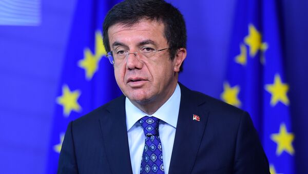 Turkish Economic Minister Nihat Zeybekci gives a press conference on May 12, 2015 after meeting with European commissioner for trade at the European Commission in Brussels - Sputnik International