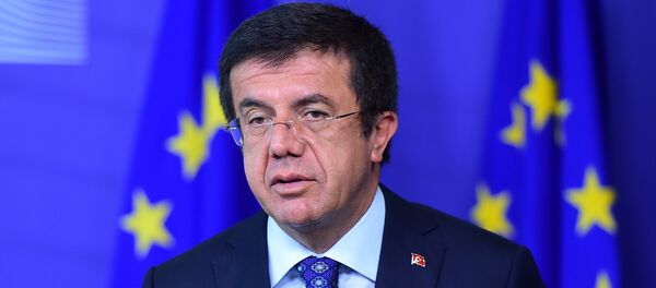 Turkish Economic Minister Nihat Zeybekci gives a press conference on May 12, 2015 after meeting with European commissioner for trade at the European Commission in Brussels - Sputnik International