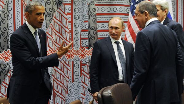 US President Barack Obama, left, gestures while speaking to Russian President Vladimir Putin, third right, as Russian Foreign Minister Sergey Lavrov, second right, and US Secretary of State John Kerry, right, look at him before a bilateral meeting at United Nations headquarters in New York, Monday, Sept. 28, 2015. - Sputnik International