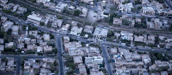 An aerial picture taken on board a helicopter shows a view of the Iraqi capital Baghdad on June 23, 2014 An aerial picture taken on board a helicopter shows a view of the Iraqi capital Baghdad on June 23, 2014 - Sputnik International