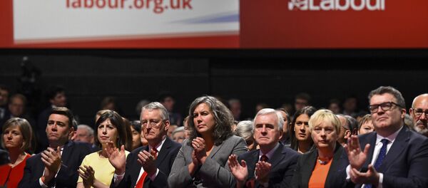 Shadow cabinet members of Britain's Labour Party applaud as leader Jeremy Corbyn delivers his keynote speech at the party's annual conference in Brighton, Britain September 29, 2015 Shadow cabinet members of Britain's Labour Party applaud as leader Jeremy Corbyn delivers his keynote speech at the party's annual conference in Brighton, Britain September 29, 2015 - Sputnik International