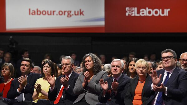 Shadow cabinet members of Britain's Labour Party applaud as leader Jeremy Corbyn delivers his keynote speech at the party's annual conference in Brighton, Britain September 29, 2015 - Sputnik International
