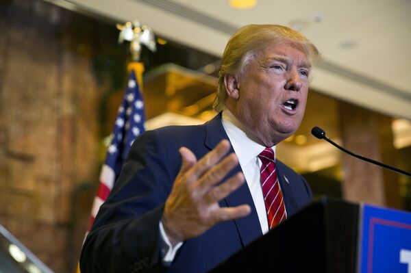 Republican presidential hopeful Donald Trump announces his tax plan during a press conference at Trump Tower in New York on September 28, 2015 Republican presidential hopeful Donald Trump announces his tax plan during a press conference at Trump Tower in New York on September 28, 2015 - Sputnik International