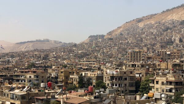 A general view shot taken on September 29, 2015, shows a neighbourhood in the Syrian capital Damascus - Sputnik International
