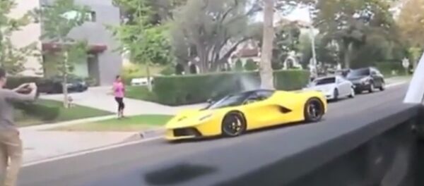 Ferrari owned by Qatari sheikh racing through quiet residential Beverly Hills neighborhood. Ferrari owned by Qatari sheikh racing through quiet residential Beverly Hills neighborhood. - Sputnik International