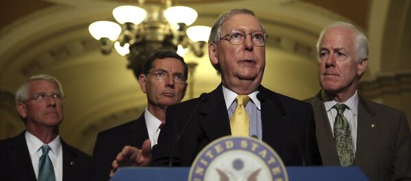 (L-R) Senate Republican leaders Senator Roger Wicker (R-MS), John Barrasso (R-WY), Senate Majority Leader Mitch McConnell (R-KY) and Senate Majority Whip John Cornyn (R-TX) take questions from the media regarding the upcoming budget battle on Capitol Hill in Washington September 29, 2015 (L-R) Senate Republican leaders Senator Roger Wicker (R-MS), John Barrasso (R-WY), Senate Majority Leader Mitch McConnell (R-KY) and Senate Majority Whip John Cornyn (R-TX) take questions from the media regarding the upcoming budget battle on Capitol Hill in Washington September 29, 2015 - Sputnik International