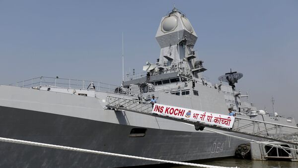 Indian Navy personnel board the newly built INS Kochi, a guided missile destroyer, during a media tour at the naval dockyard in Mumbai, India September 28, 2015 - Sputnik International