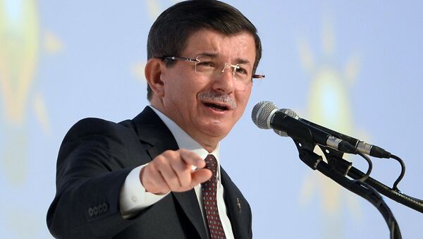 Turkish Prime Minister and Justice and Development Party (AKP) leader Ahmet Davutoglu delivers a speech during the introductory meeting of AKP candidates for the upcoming general election at Ankara Sports Hall on September 21, 2015 - Sputnik International
