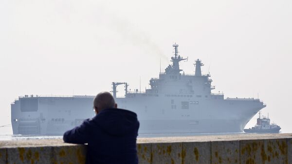 This file photo taken on March 16, 2015 off Saint-Nazaire, northwestern France, shows the Sevastopol mistral warship on its way for its first sea trials. - Sputnik International