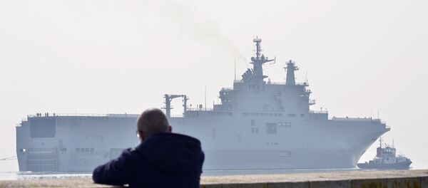 This file photo taken on March 16, 2015 off Saint-Nazaire, northwestern France, shows the Sevastopol mistral warship on its way for its first sea trials. - Sputnik International