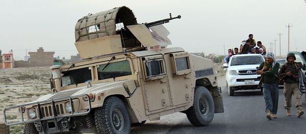 In this picture taken on Tuesday, Sept. 29, 2015 Afghanistan's security forces patrol of Kunduz city, north of Kabul, Afghanistan. - Sputnik International