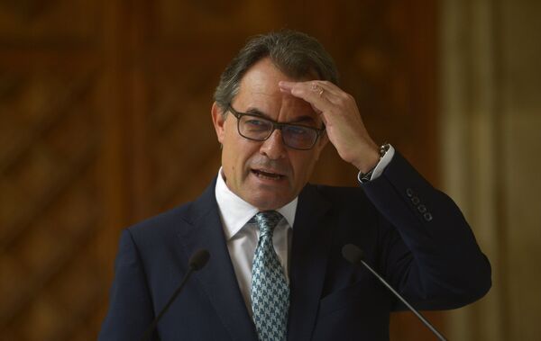 In this Tuesday, Oct. 14, 2014 file photo, Catalonia's regional president Artur Mas gestures during a press conference at the Generalitat Palace in Barcelona, Spain. Catalonia's acting regional president has been placed under investigation by a court for his role in staging a referendum on independence last year, officials said Tuesday Sept 29, 2015 In this Tuesday, Oct. 14, 2014 file photo, Catalonia's regional president Artur Mas gestures during a press conference at the Generalitat Palace in Barcelona, Spain. Catalonia's acting regional president has been placed under investigation by a court for his role in staging a referendum on independence last year, officials said Tuesday Sept 29, 2015 - Sputnik International