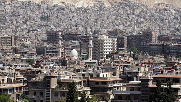A general view shot taken on June 30, 2015, shows a neighbourhood in the Syrian capital Damascus - Sputnik International