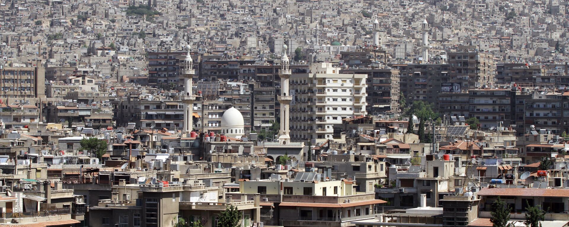 A general view shot taken on June 30, 2015, shows a neighbourhood in the Syrian capital Damascus - Sputnik International, 1920, 06.05.2023