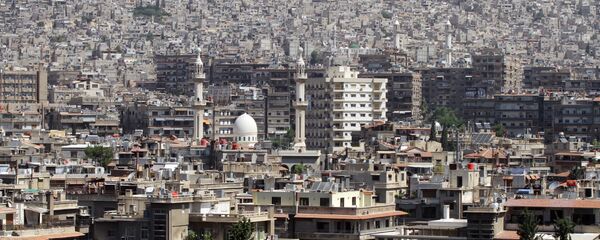 A general view shot taken on June 30, 2015, shows a neighbourhood in the Syrian capital Damascus A general view shot taken on June 30, 2015, shows a neighbourhood in the Syrian capital Damascus - Sputnik International