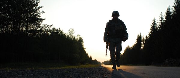 U.S. Army Cpl. Mihai Mocanu of Bravo Company, 2nd Battalion, 6th Infantry Regiment, performs a ruck march during the United States Army Europe Soldier and NCO of the Year Competition Aug. 15, 2007, at the Grafenwoehr Training Area in Germany. U.S. Army Cpl. Mihai Mocanu of Bravo Company, 2nd Battalion, 6th Infantry Regiment, performs a ruck march during the United States Army Europe Soldier and NCO of the Year Competition Aug. 15, 2007, at the Grafenwoehr Training Area in Germany. - Sputnik International