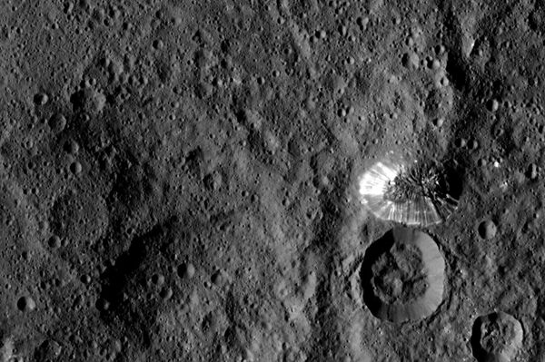 Giant mountain next to crater on Ceres Giant mountain next to crater on Ceres - Sputnik International