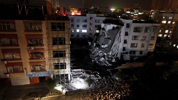 A damaged building is seen after explosions hit Liucheng, Guangxi Zhuang Autonomous Region - Sputnik International