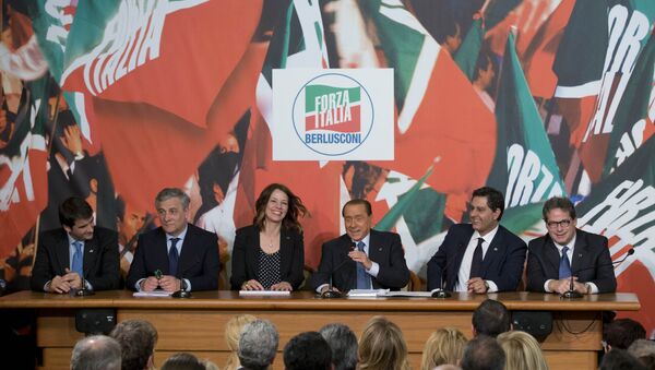 Italian former Premier and Forza Italia, Go Italy, party leader Silvio Berlusconi, third from right, and his party's candidates for the upcoming European Parliament elections, from left, Raffaele Fitto, Antonio Tajani, Elisabetta Gardini, Giovanni Toti and Gianfranco Micciche', meet the journalists during a press conference, in Rome - Sputnik International
