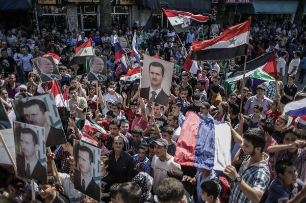 Rally to support Bashar al-Assad and Vladimir Putin in Latakia, file photo - Sputnik International