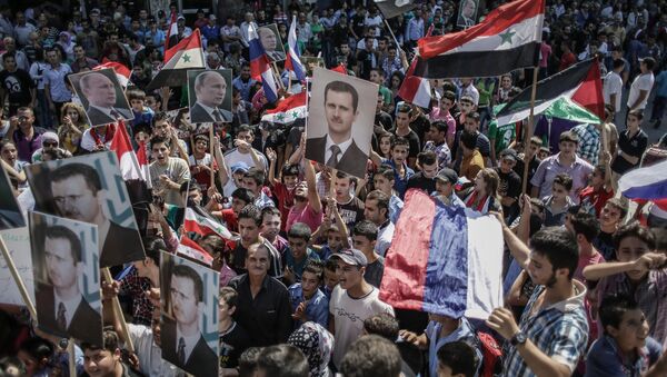 Rally to support Bashar al-Assad and Vladimir Putin in Latakia, file photo - Sputnik International
