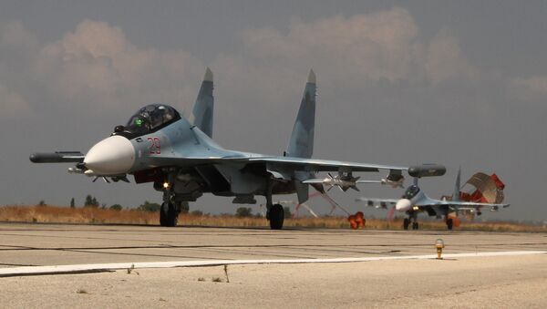 Russian Su-30 jets landing at the Hmeymim Air Base. File photo - Sputnik International