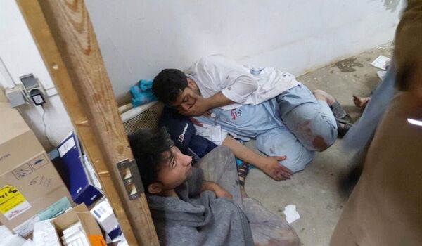 Injured Doctors Without Borders staff are seen after explosions near their hospital in the northern Afghan city of Kunduz, Saturday, Oct. 3, 2015 Injured Doctors Without Borders staff are seen after explosions near their hospital in the northern Afghan city of Kunduz, Saturday, Oct. 3, 2015 - Sputnik International