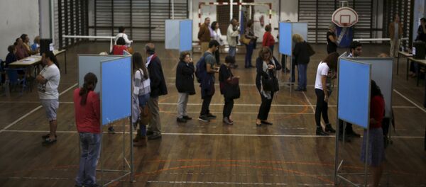 People vote at a polling station during the general election in Lisbon, Portugal October 4, 2015. People vote at a polling station during the general election in Lisbon, Portugal October 4, 2015. - Sputnik International
