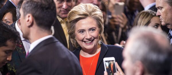Democratic presidential candidate Hillary Clinton has a picture taken by a supporter after speaking at the Human Rights Campaign Breakfast in Washington, October 3, 2015 Democratic presidential candidate Hillary Clinton has a picture taken by a supporter after speaking at the Human Rights Campaign Breakfast in Washington, October 3, 2015 - Sputnik International