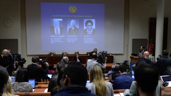 The portraits of the winners of the Nobel Medicine Prize 2015 (L-R) Irish-born William Campbell, Satoshi Omura of Japan and China's Youyou Tu are displayed on a screen during a press conference of the Nobel Committee to announce the winners of the 2015 Nobel Medicine Prize on October 5, 2015 at the Karolinska Institutet in Stockholm, Sweden - Sputnik International