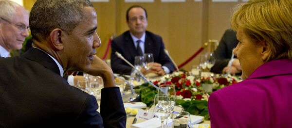 US President Barack Obama, President of the European Council Herman van Rompuy, France's President Francois Hollande, Germany's Chancellor Angela Merkel attend a working dinner at the G7 summit at the European Council headquarters on June 4, 2014 in Brussels US President Barack Obama, President of the European Council Herman van Rompuy, France's President Francois Hollande, Germany's Chancellor Angela Merkel attend a working dinner at the G7 summit at the European Council headquarters on June 4, 2014 in Brussels - Sputnik International