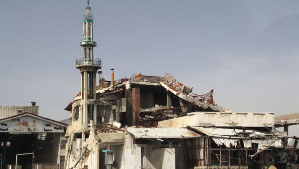 A mosque destroyed as a result of the hostilities in Homs, Syria - Sputnik International