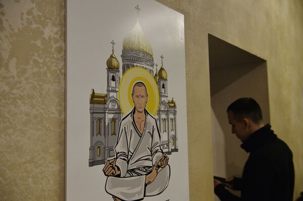 Изображение президента России Владимира Путина в образе Будды на выставке Вселенная Путина в Москве - Sputnik International