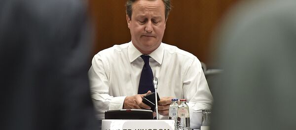 British Prime Minister David Cameron attends the emergency EU heads of state summit on the migrant crisis at the EU Commission headquarters in Brussels on Wednesday, Sept. 23, 2015. - Sputnik International