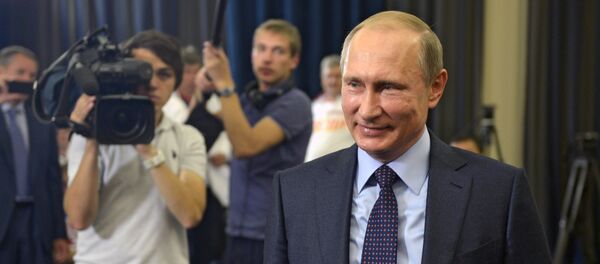 President Vladimir Putin meets with winners of the 2015 IWAS World Games - Sputnik International