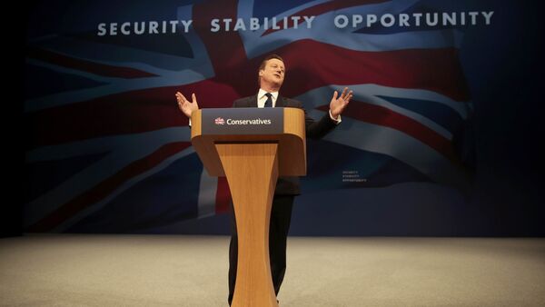 Britain's Prime Minister David Cameron gestures as he delivers his keynote address at the annual Conservative Party Conference in Manchester, Britain October 7, 2015 - Sputnik International