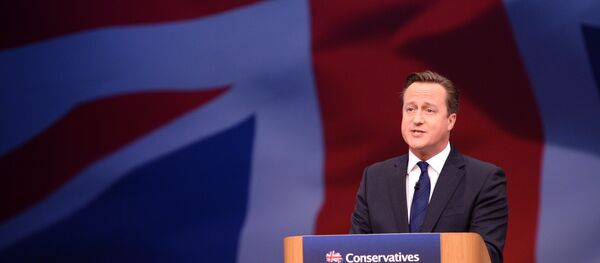Britain's Prime Minister David Cameron gestures as he delivers his keynote address at the annual Conservative Party Conference in Manchester, Britain October 7, 2015. Britain's Prime Minister David Cameron gestures as he delivers his keynote address at the annual Conservative Party Conference in Manchester, Britain October 7, 2015. - Sputnik International