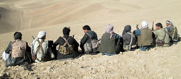 In this photo taken on Thursday, Oct. 1, 2015, Afghan security forces and volunteer militias stage on their way to Kunduz, Afghanistan to fight against Taliban fighters - Sputnik International