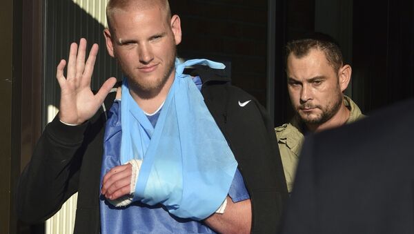 U.S. serviceman Spencer Stone waves as he departs the Clinique Lille Sud, which specializes in hand injuries, in Lesquin, France, in an August 22, 2015 file photo - Sputnik International