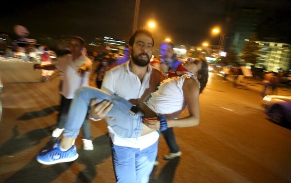 A man carries a protester affected by tear gas released by security forces in Martyr square, downtown Beirut, Lebanon October 8, 2015. Lebanese security forces fired tear gas and water cannons to break up an anti-government protest in Beirut on Thursday, and the country's fractious leaders postponed talks aimed at resolving a political crisis that is feeding public discontent. - Sputnik International