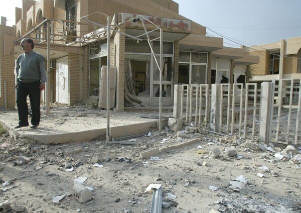 An Iraqi walks amid debris outside a maternity clinic in Baghdad after a US-British air raid 02 April 2003. The Red Crescent clinic was hit in air strikes over Baghdad this afternoon An Iraqi walks amid debris outside a maternity clinic in Baghdad after a US-British air raid 02 April 2003. The Red Crescent clinic was hit in air strikes over Baghdad this afternoon - Sputnik International