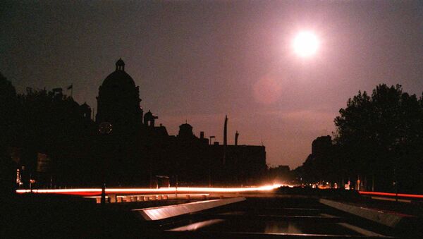 The dome of the Yugoslav Parliament building in downtown Belgrade is lit by moonlight after NATO jets hit power plants in Serbia during air raids early Monday May 3, 1999 plunging most of the country into darkness. Power was restored before dawn primarily to the hospitals, water supply services and bakeries - Sputnik International