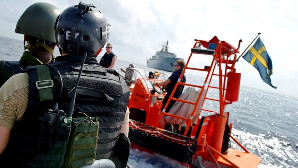 Boarding teams of HSwMS Carlskrona exercising on the way to join the EU Naval Force, April 2013. - Sputnik International