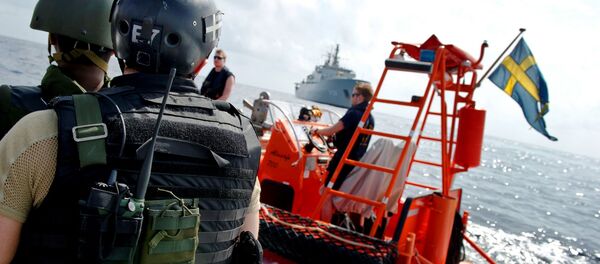 Boarding teams of HSwMS Carlskrona exercising on the way to join the EU Naval Force, April 2013. Boarding teams of HSwMS Carlskrona exercising on the way to join the EU Naval Force, April 2013. - Sputnik International