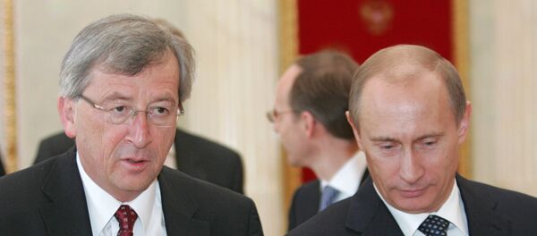 Russian President Vladimir Putin and Jean-Claude Juncker - Sputnik International
