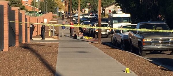 Authorities investigate the scene outside a student dormitory in Flagstaff, Ariz - Sputnik International