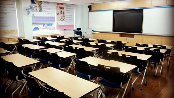 Empty desks in a classroom - Sputnik International