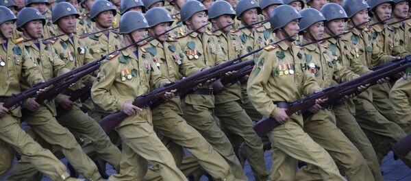 North Korean soldiers parade on Kim Il Sung Square, Saturday, Oct. 10, 2015, in Pyongyang, North Korea - Sputnik International